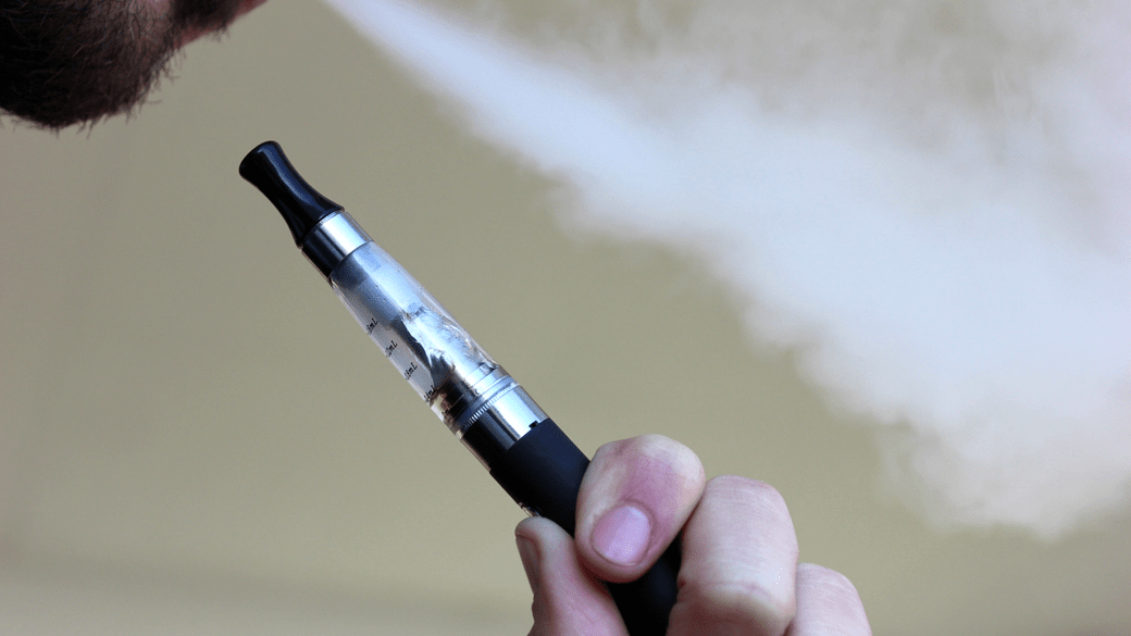 Person smoking an e-cigarette